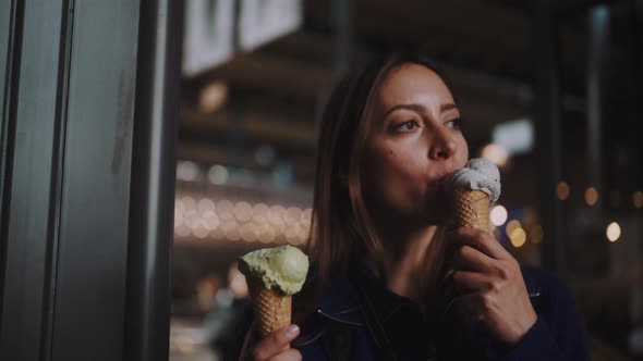 Young woman eating ice creams