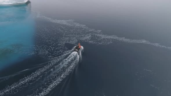 Antarctica Aerial Flight Over Fast Moving Boat.