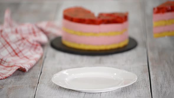 Piece of Cake with a Vanilla Biscuit, Raspberry Mousse and Jelly, Sweet Pastries