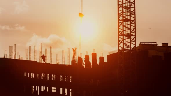 Crane Elevate Steel Structures Weight on Construction Working Sunset Golden Hour alt