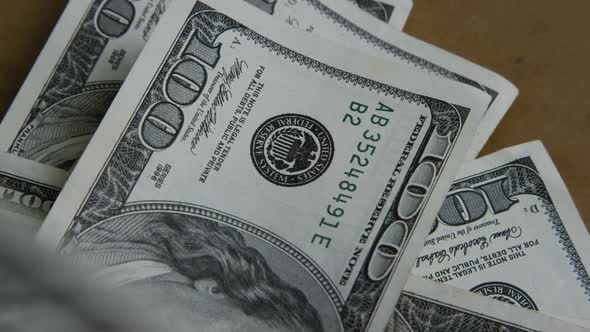 Rotating stock footage shot of $100 bills - MONEY 0153