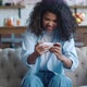 Funny African American Woman Playing on Her Smartphone Exciting Mobile Application - VideoHive Item for Sale