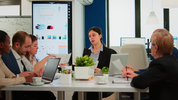 Group of Diverse Business People Having a Meeting in Conference Room