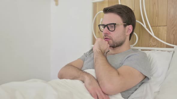 Focused Beard Young Man Thinking About Idea in Bed