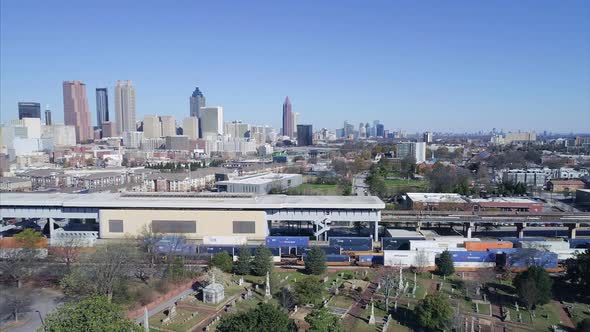 Flying Over the Oakland Cemetery Viewing the Atlanta Skyline