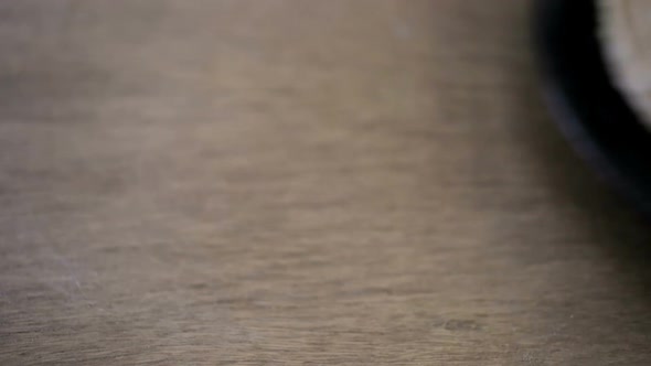 Fresh multi-grain tortillas on a wood background.