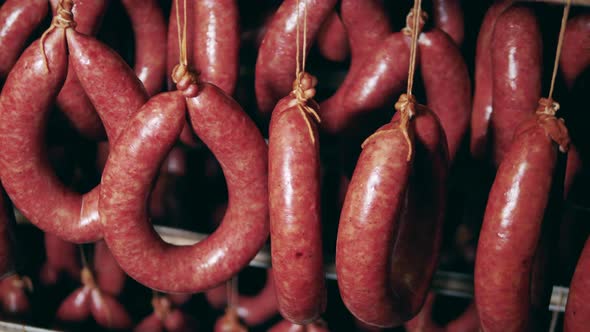 Red Wieners Cooked on a Rack at Meat Factory