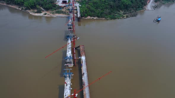 Aerial View Of  Construction Over The Mekong River For The High Speed Railway Linking China To Laos