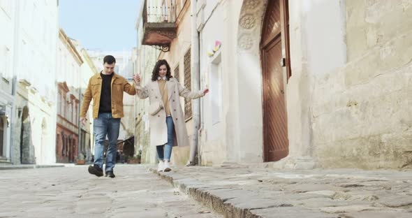 Sweet Couple Have Vacation in Old European Town