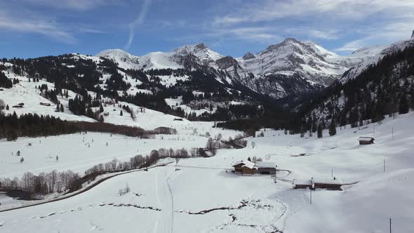 Aerial of wooden houses in the snow