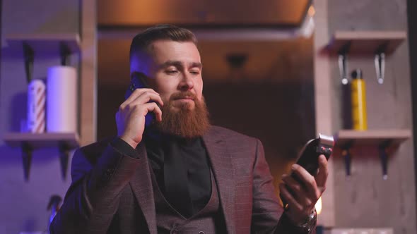 Successful Male Barber Shop Owner Sits Feel Himself Superior Indoors