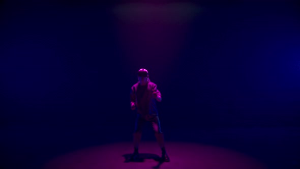 Vr Man Gesturing Game in Neon Lights Room