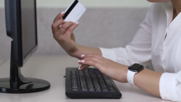 Girl doing online shopping in the office