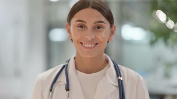 Portrait of Female Doctor Shaking Head in Yes Sign