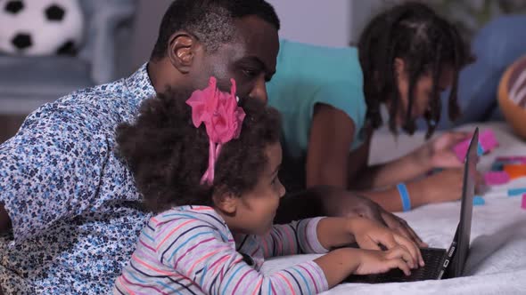 Mixed Race Family Enjoying Leisure During Lockdown