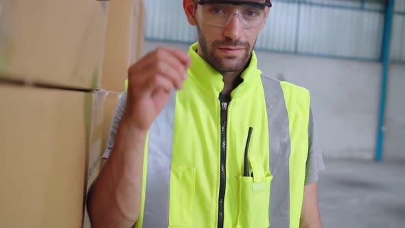 Professional Industry Worker Close Up Portrait in the Factory or Warehouse