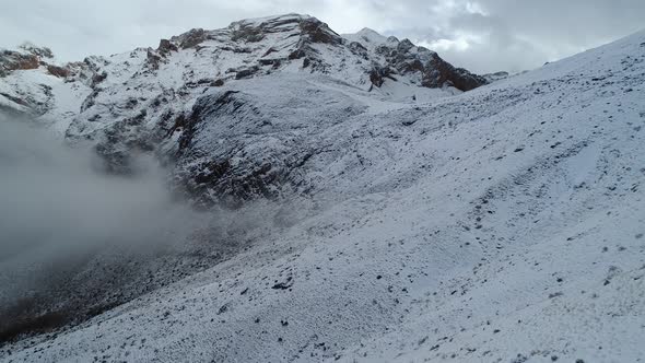 Clouds Over The Snowy Mountains