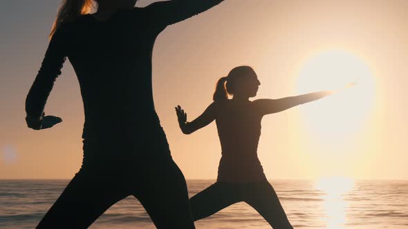 Group Of Women Practicing Yoga