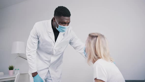 Elderly Woman in Doctors Office During Coronavirus Outbreak