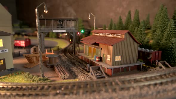 Model Railway Station with Moving Model Locomotive.