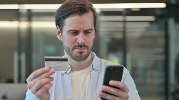 Online Payment Failure on Smartphone for Mature Adult Man