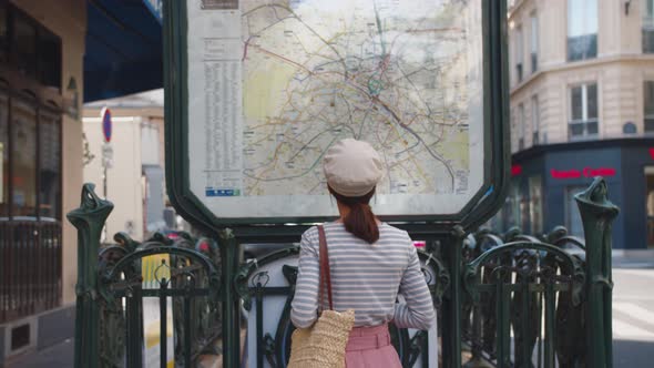 A young girl at the metro station in Paris