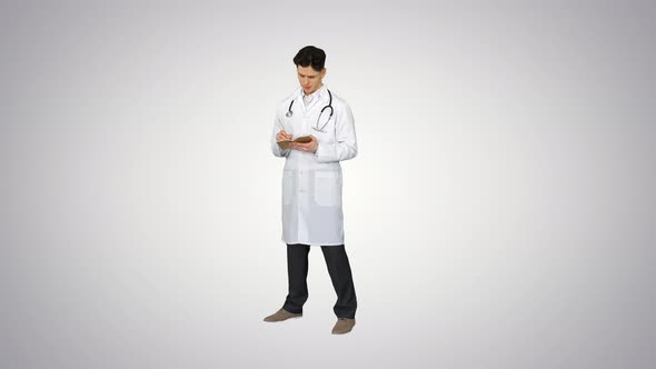 Expressive Young Male Doctor with Creative Idea Starts Dancing on Gradient Background