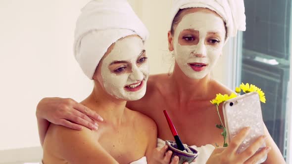 Beautiful Woman Having a Facial Treatment at Spa