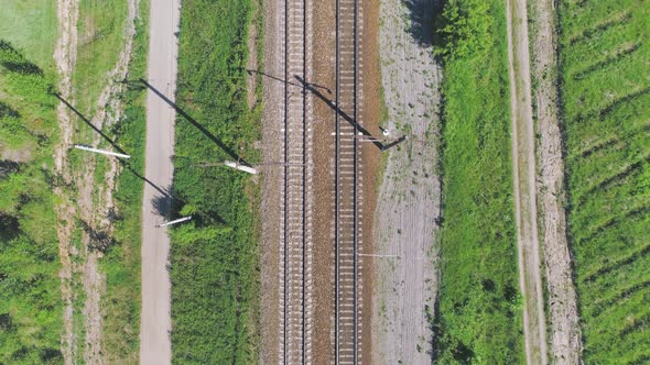 Electrified Railway Track. The Camera Moves Along the Rail Direction.