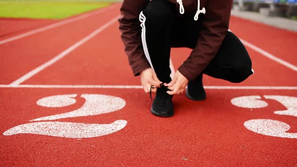 Man on the Stadium before Start Line and Numbers