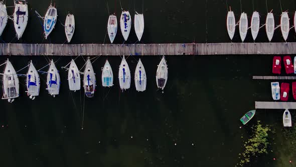 Fly over the small marina with lots of boats, 4k Drone.