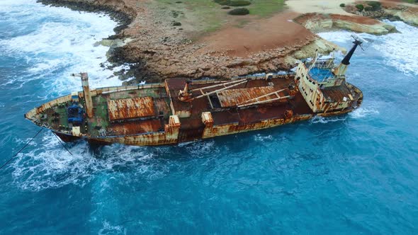 Wreck Sunken Ship in the Sea or Ocean Environmental Disaster Old Rusty Ship in Storm Sea Water