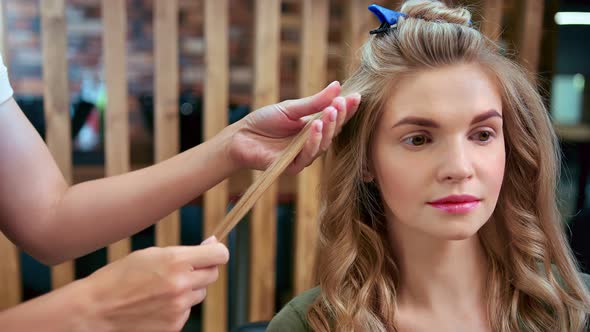 Face of Female at Beauty Salon During Creating Hairstyle