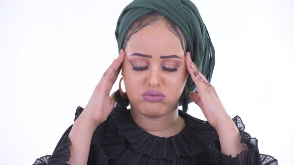 Face of Stressed Young African Muslim Woman Having Headache