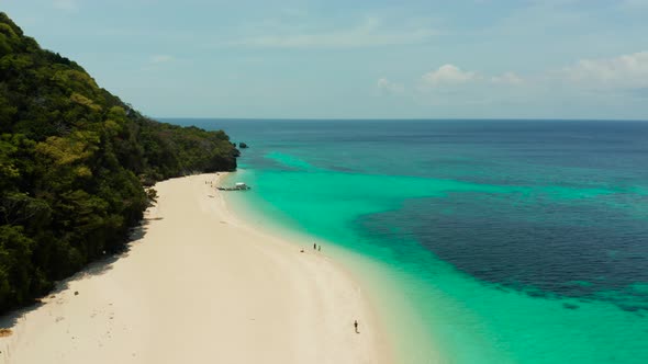 Tropical Beach and Turquoise Lagoon Water