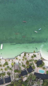 Boat Boats in the Ocean Near the Coast of Zanzibar Tanzania Slow Motion Vertical Video