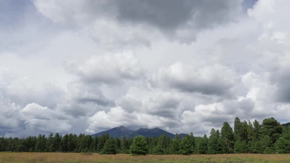 Storm Clouds over Mountain Time Lapse alt