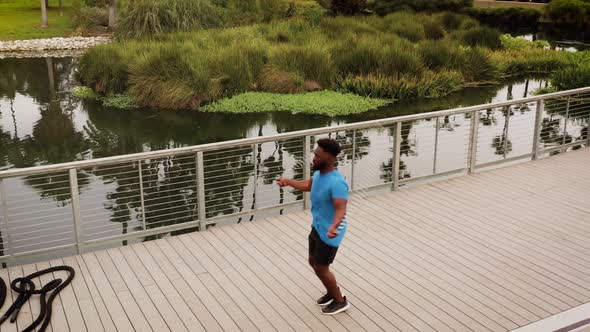 Aerial shot of a man working out in the park