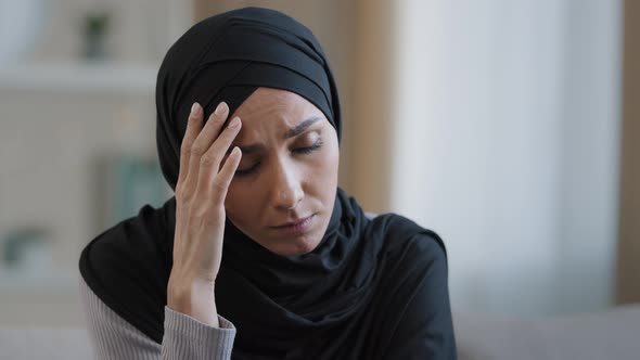 Upset Sad Girl in Hijab Sit Alone Get Bad News Feel Depressed Frustrated Muslim Woman Suffering From