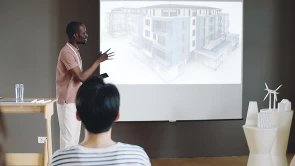 African American Man Presenting Architectural Project on Conference