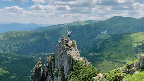 Happy Hiker Winning Reaching Life Goal Success Freedom and Happiness Achievement in Mountains