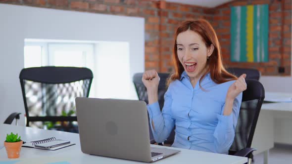 Redheaded Excited Employee