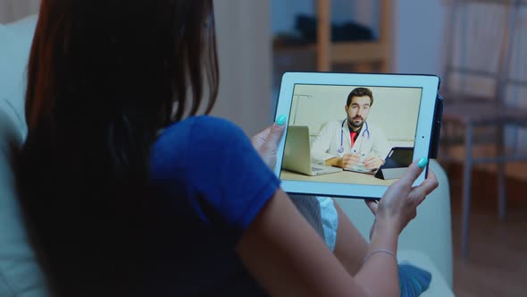 Patient Having Video Conference with Doctor