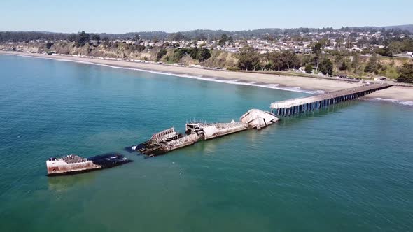 Seacliff State Beach and sunken vessel of SS Palo Alto. Aerial descend view