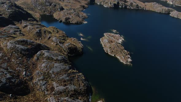 4k aerial drone footage over the 4th lagoon of Pichgacocha from Ambo, Huanuco, Peru in the Andes mou