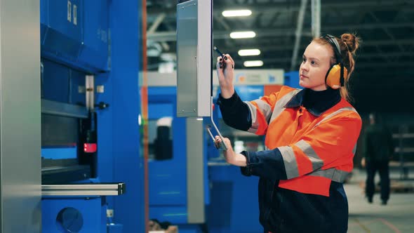 Machinery Console is Being Managed By a Female Operator