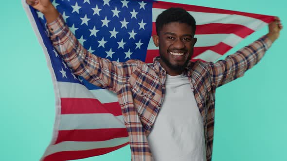 Man Waving Wrapping in American USA Flag Celebrating Human Rights Freedoms Independence Day