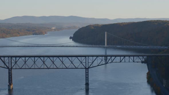 Aerial of walkway and Mid-Hudson Bridge over Hudson river