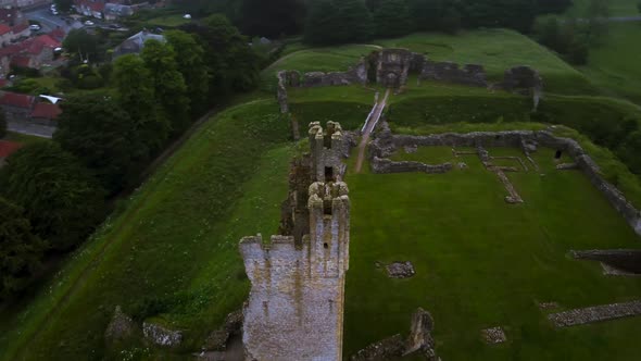 Drone Helix of Medieval Helmsley Castle Town and Walled Garden at Dusk