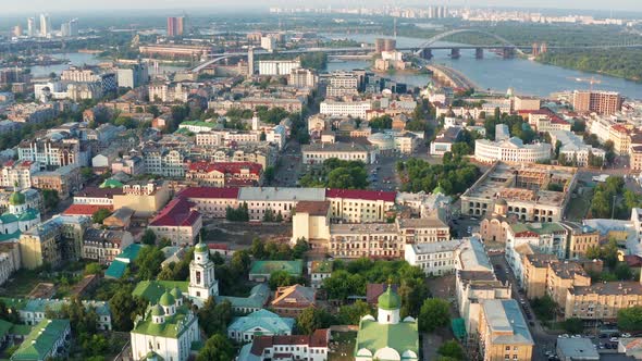 Top view of Podol. Many buildings and churches. Evening view of the river  Dnipro.